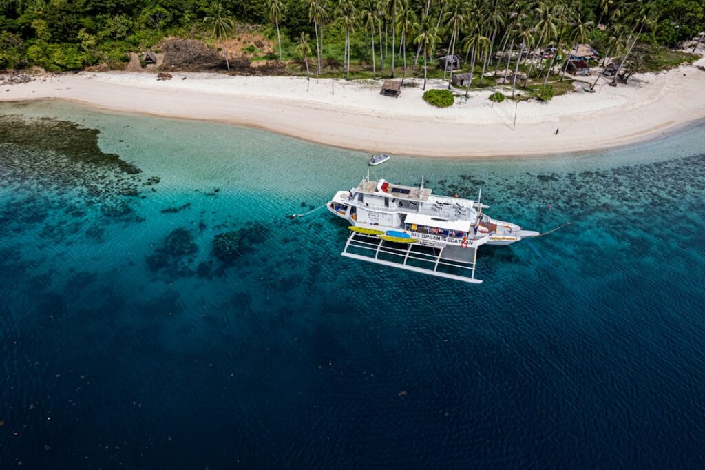 hidden coastal destinations asia — secluded tropical beach turquoise water