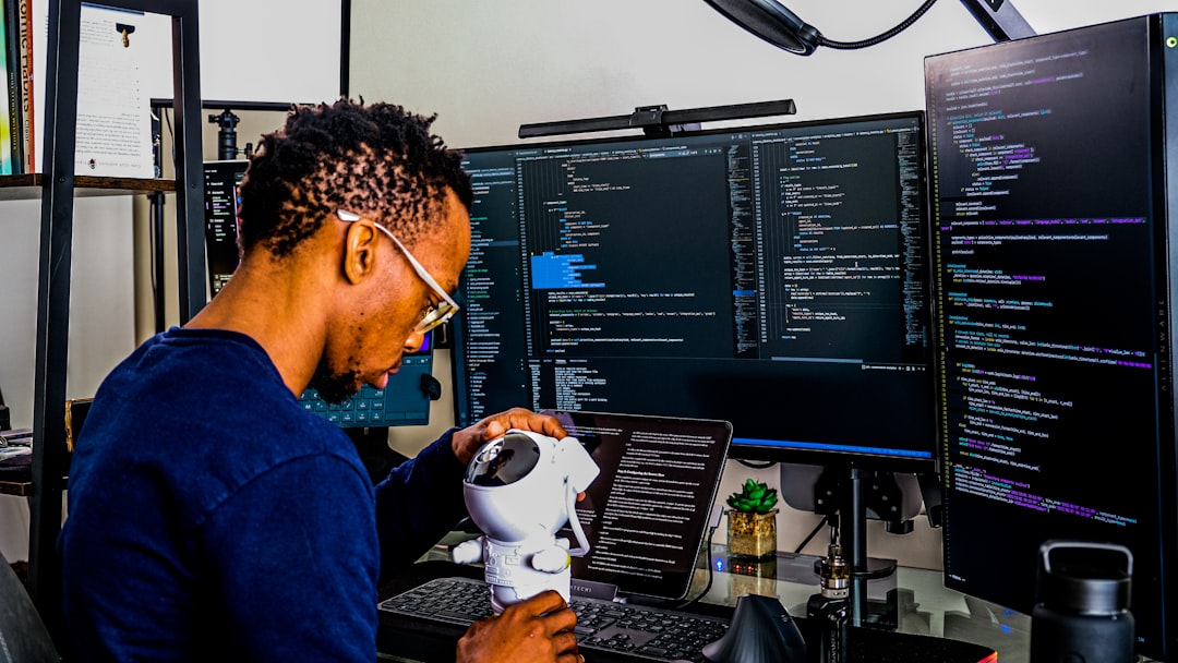 machine learning model keeps drifting — data scientist reviewing drift detection alerts on a split-screen monitoring tool