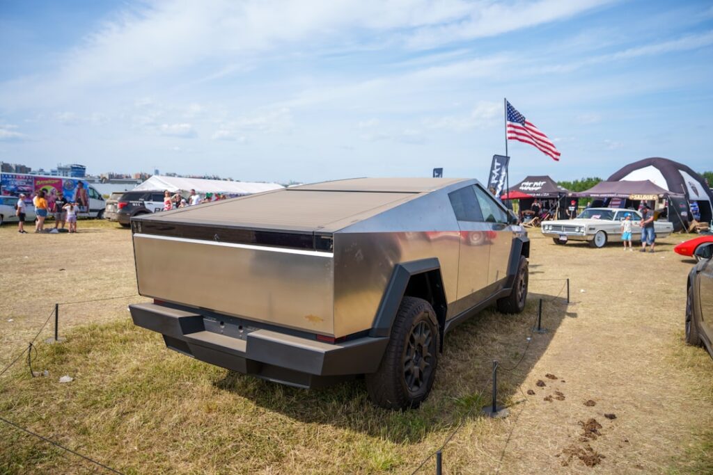 A futuristic truck parked at an outdoor event
