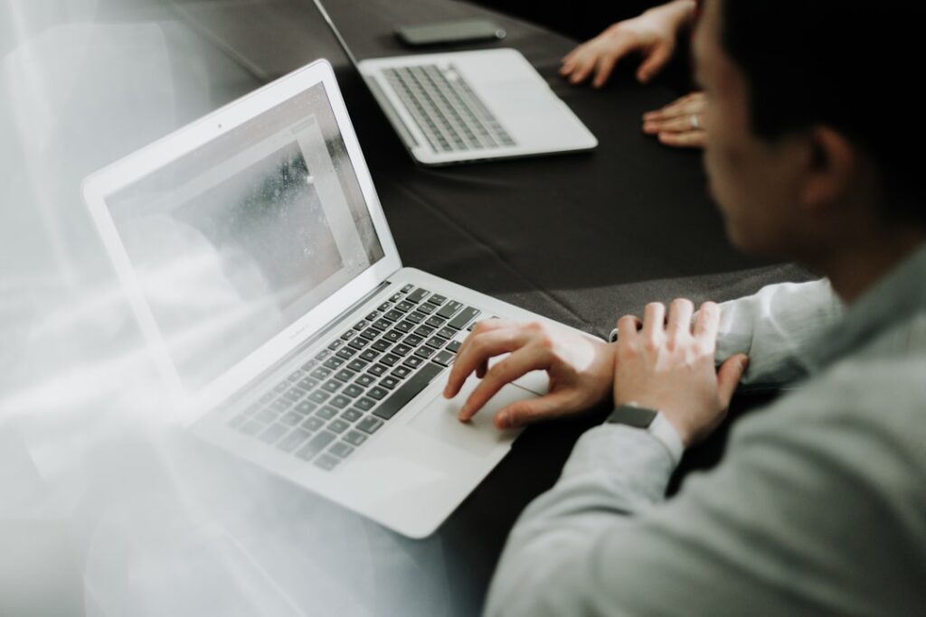 micro-credentials online certifications continue — professional studying laptop certificate screen
