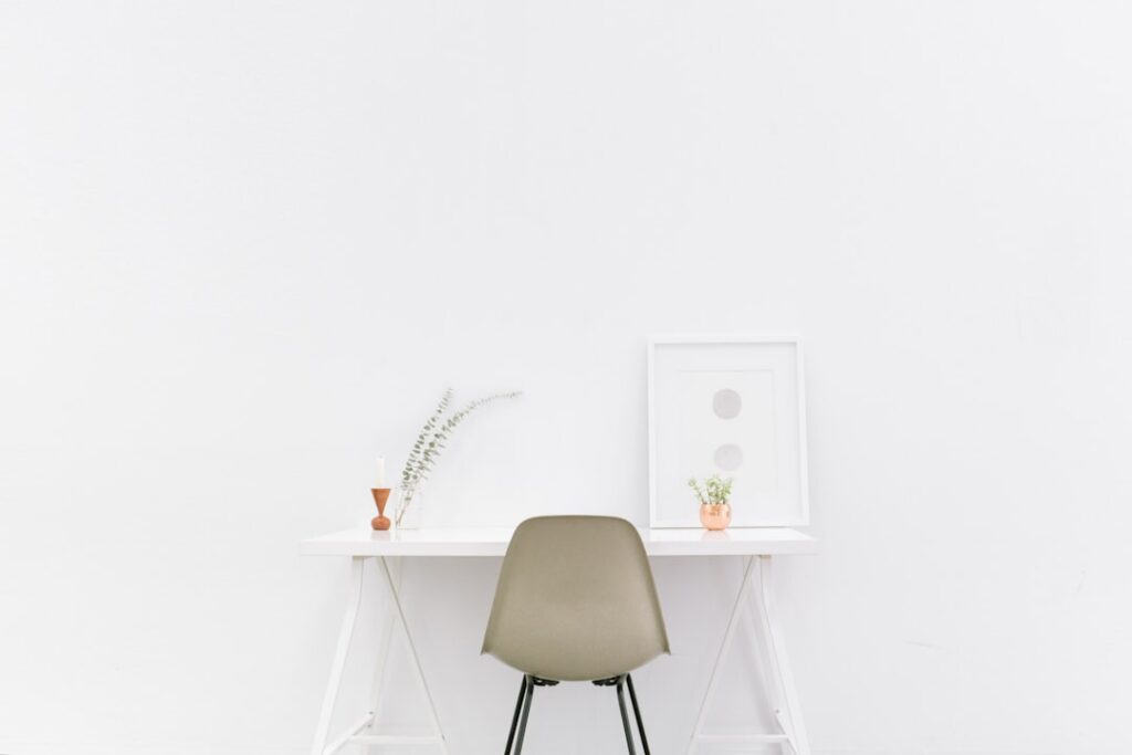 interior wellness design modern — Minimalist bright workspace natural light plants