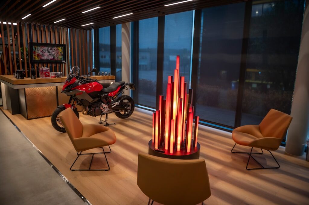 premium electric motorcycles global — sleek electric motorcycle showroom display
