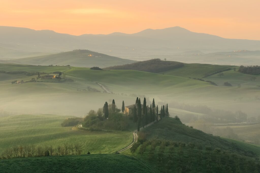 off-season luxury travel popular — Tuscany villa autumn golden light