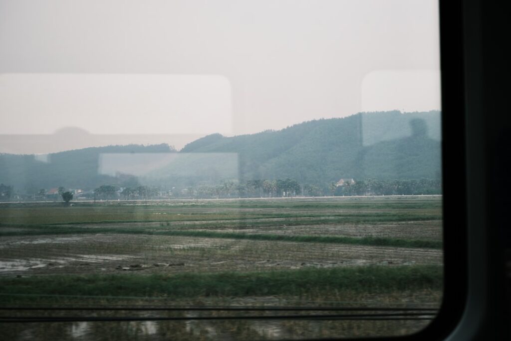 train travel comeback among — scenic train window countryside landscape