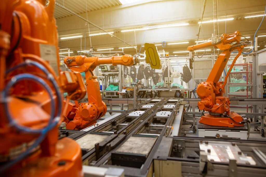 smart factories industrial productivity — factory floor robotic automation machinery