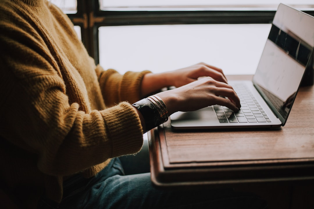 technology global education accessible — student on laptop taking an online course from home