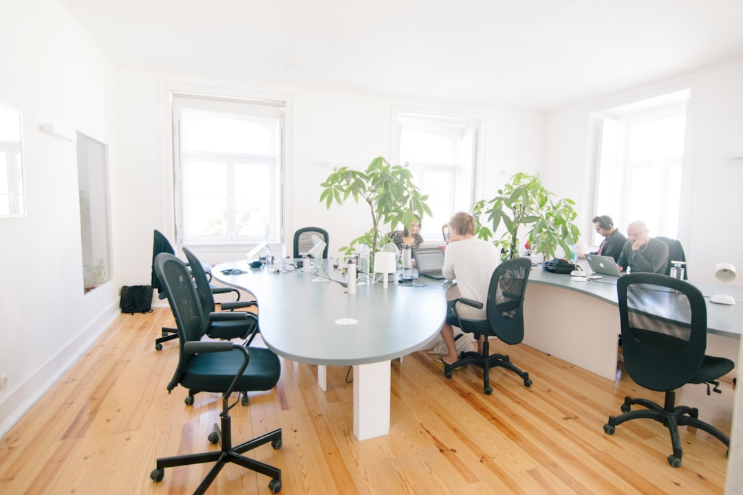 mindful productivity new success — team collaborating mindfully in modern office space with natural light