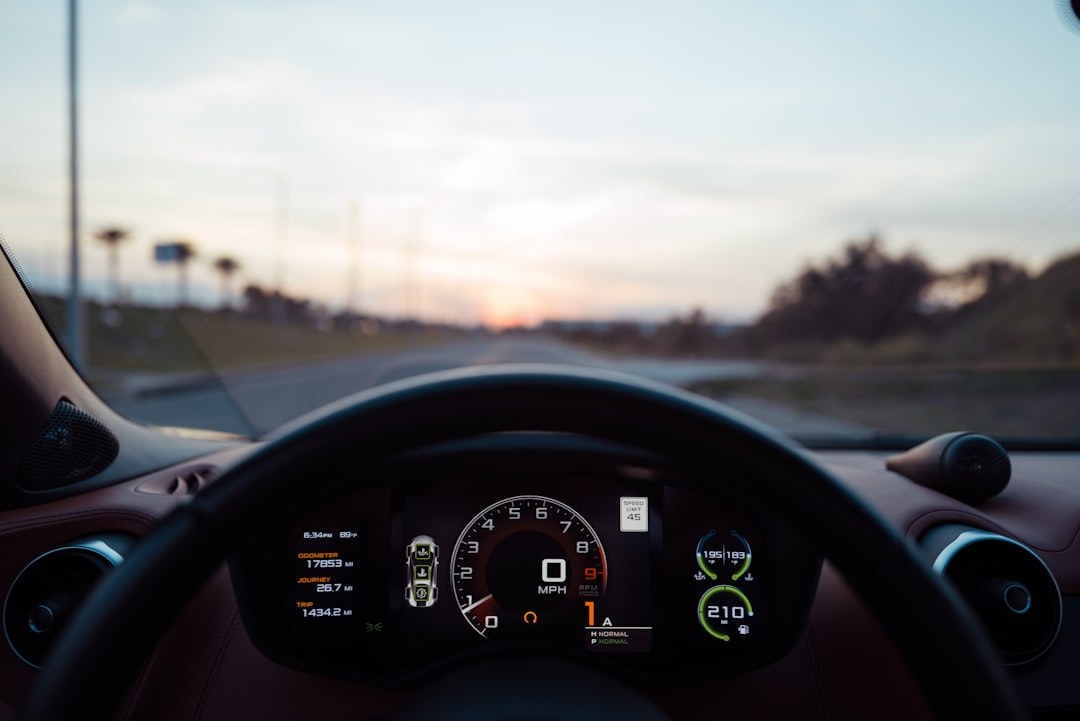future in-car entertainment smart — connected vehicle dashboard displaying navigation and AI controls