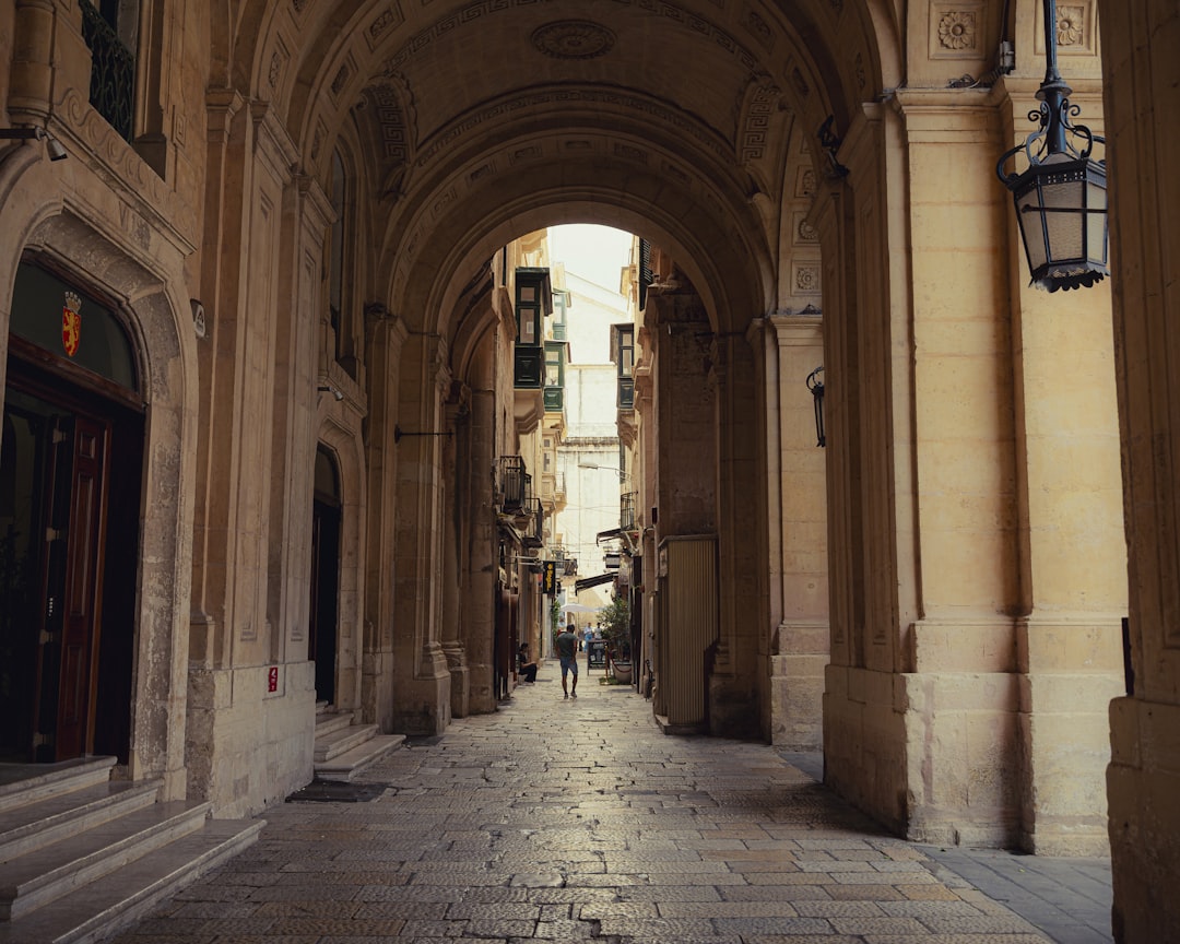 growing appeal cultural tourism — travelers exploring historic alleyways in a Mediterranean city