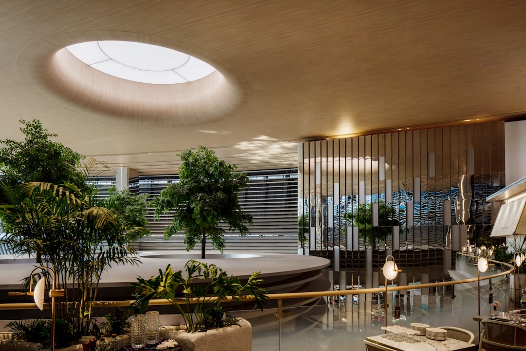 future luxury residential developments — interior space with natural light, biophilic design elements, and sustainable materials in luxury home