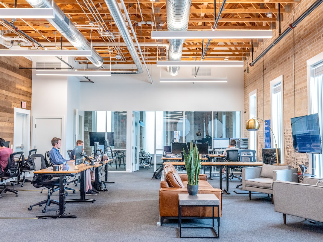 sovereign wealth funds global — modern office workspace with team analyzing market data on large screens