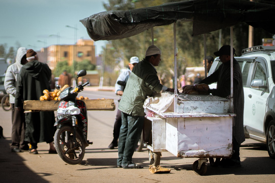 rise digital banking developing — UPI QR code payment processing on a street market stall