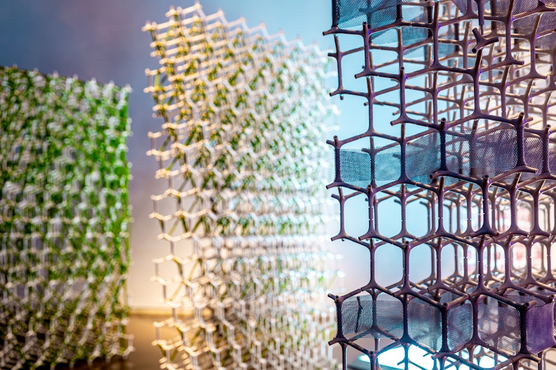advanced materials future manufacturing — graphene composite sample under microscope with crystalline structure visible