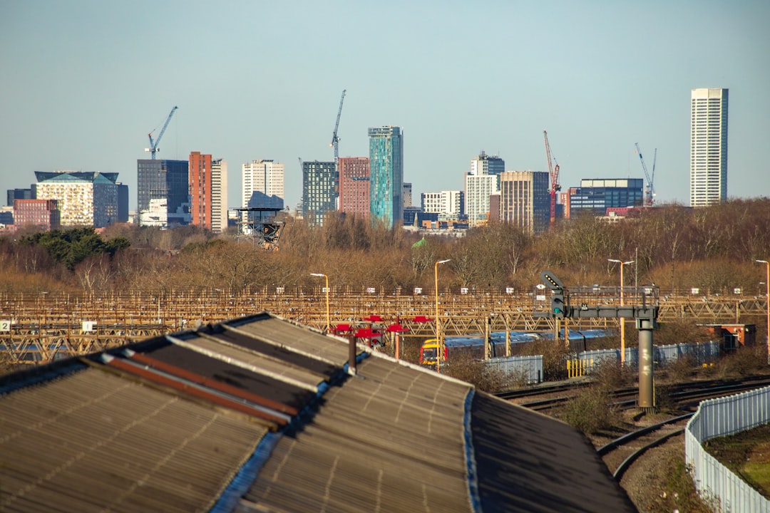 future sustainable infrastructure investments — solar and wind farm landscape with city skyline