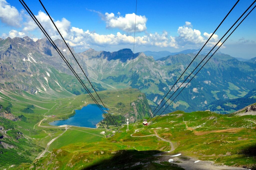 mountain destinations tourism growth — Alpine valley hiking trail panoramic view
