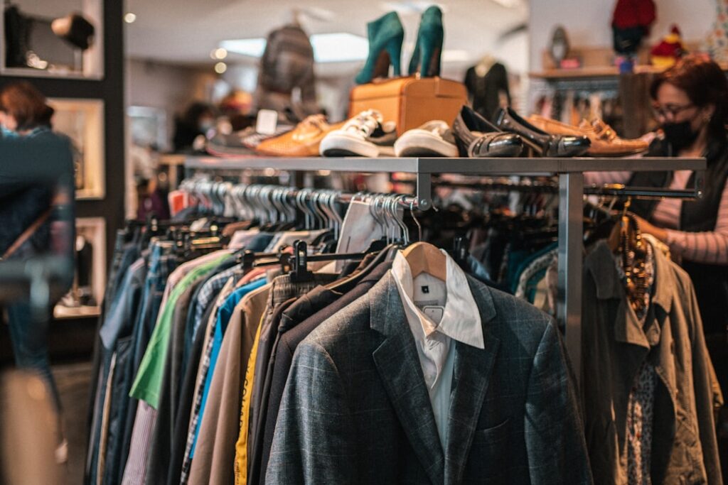 rise recommerce — vintage clothing rack thrift store