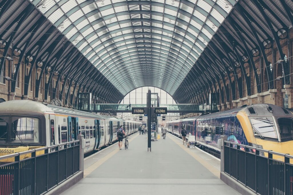 high-speed rail transform regional — modern train station sleek platform