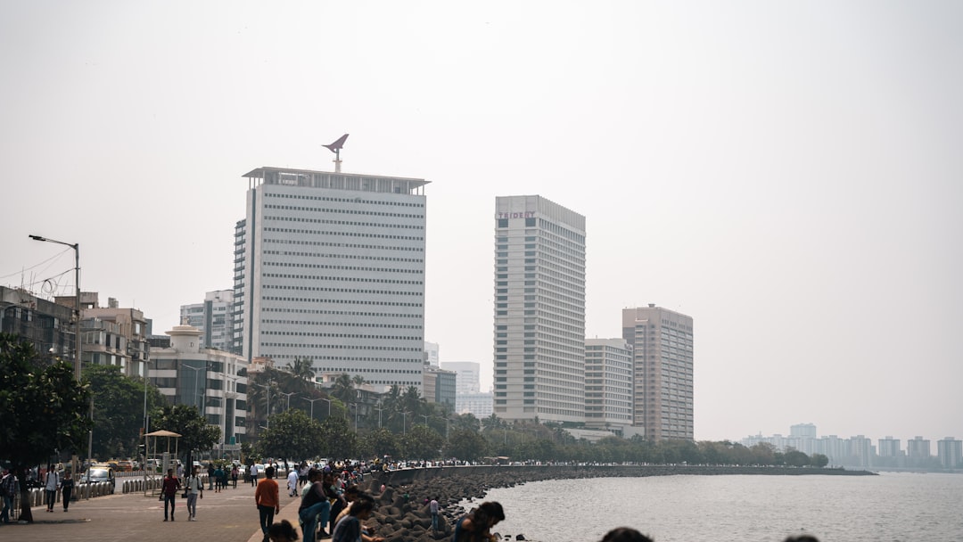 emerging markets global economic — traders analyzing financial data in Mumbai office