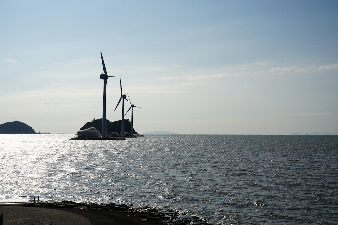 ocean technology sustainable industries — offshore wind turbines and tidal energy devices working in tandem in coastal waters