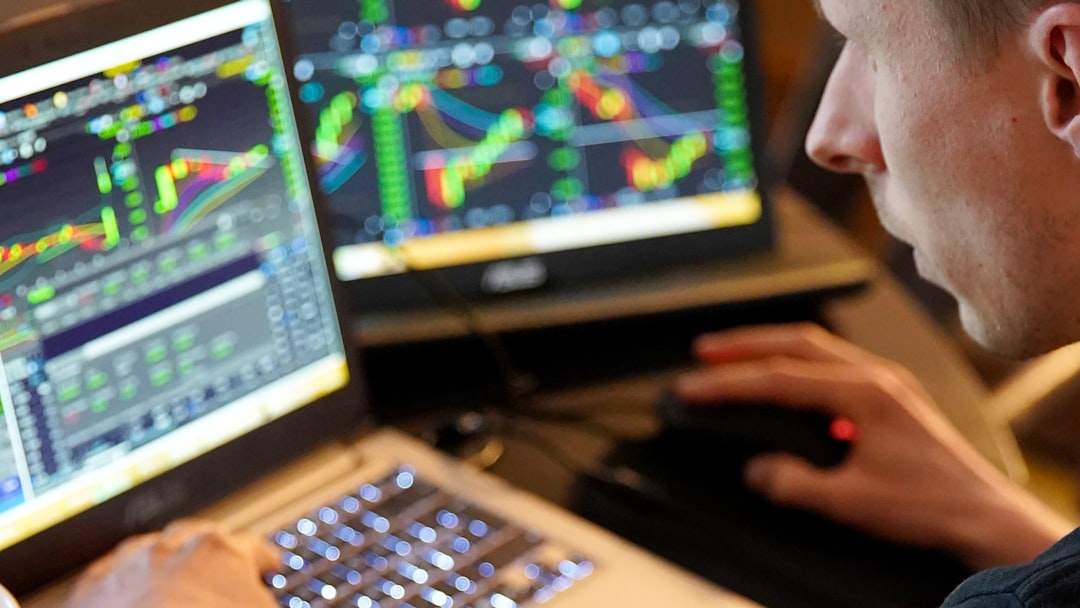 infrastructure funds long-term investors — financial analyst reviewing infrastructure fund performance charts on a dual-monitor setup