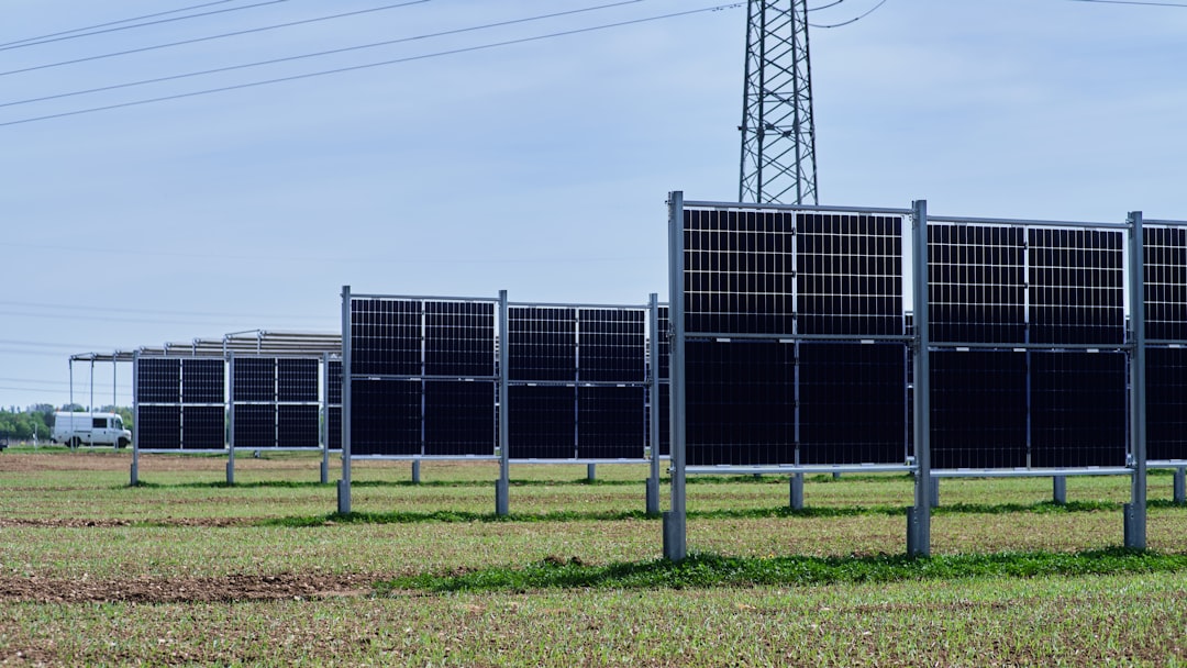 future renewable energy storage — utility-scale battery containers installed in rows across wide open field