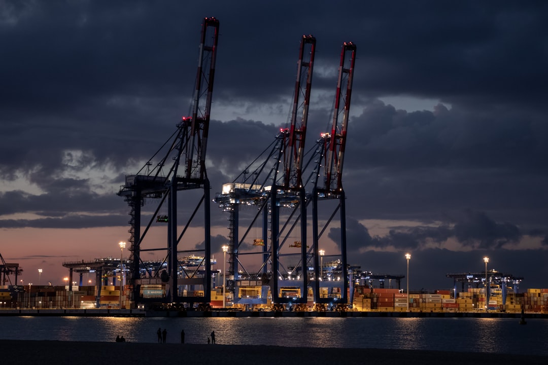 regional trade agreements global — container ships lined up at international port terminals