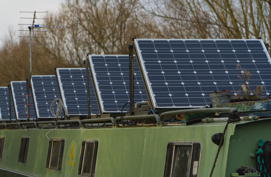 high-speed rail transform regional — renewable energy solar panels alongside modern train infrastructure