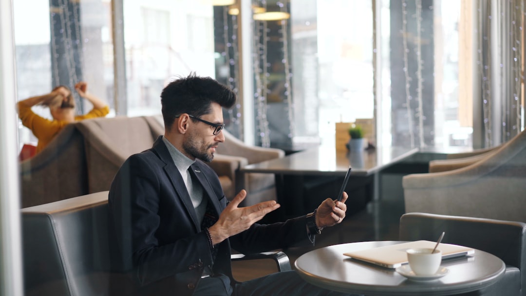 open banking competition financial — bank executive reviewing open APIs integration roadmap on tablet device