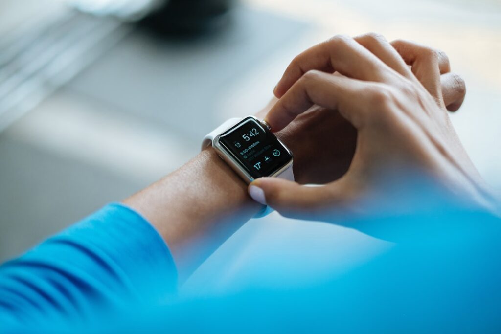 sleep technology major consumer — person sleeping smartwatch tracking data