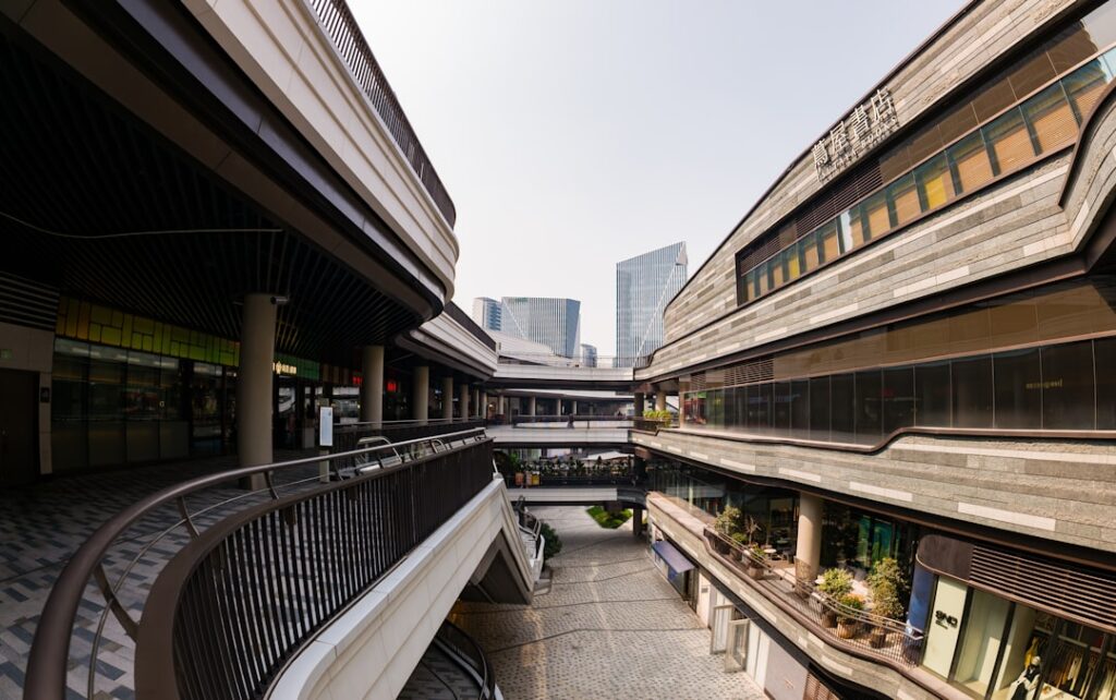 changing face shopping malls — empty mall corridor modern architecture