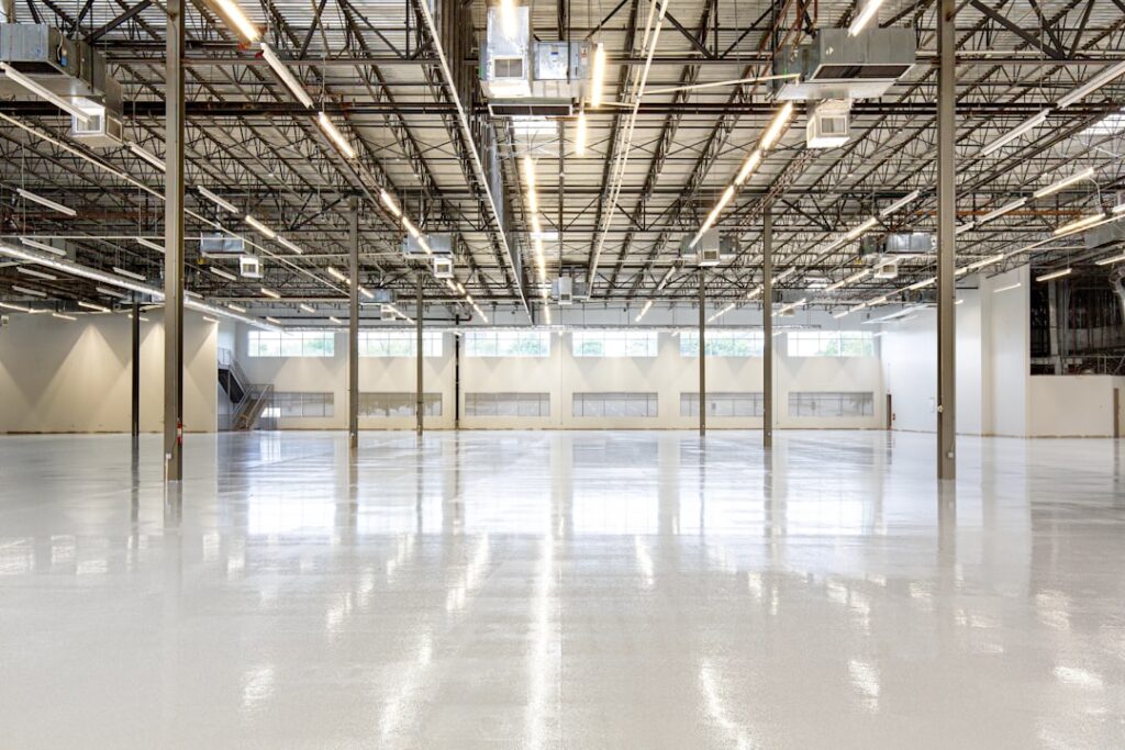 global manufacturers production closer — manufacturing facility warehouse interior