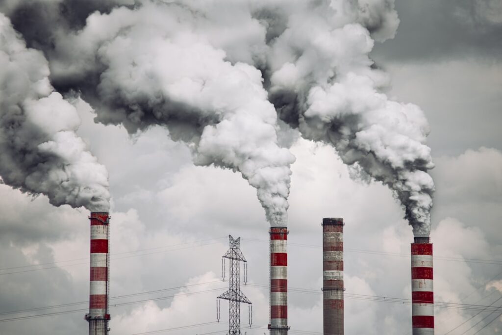 carbon capture strategic industry — industrial steel factory emissions smokestack