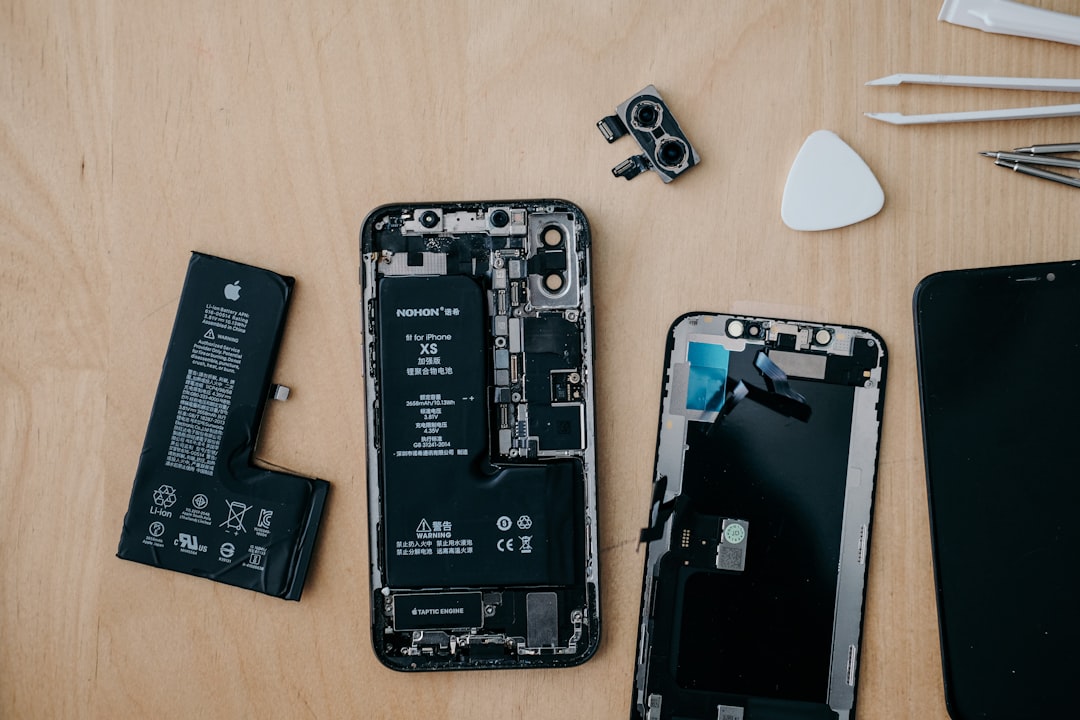 repairable electronics consumer technology — repairability score labels displayed on smartphone packaging in retail setting