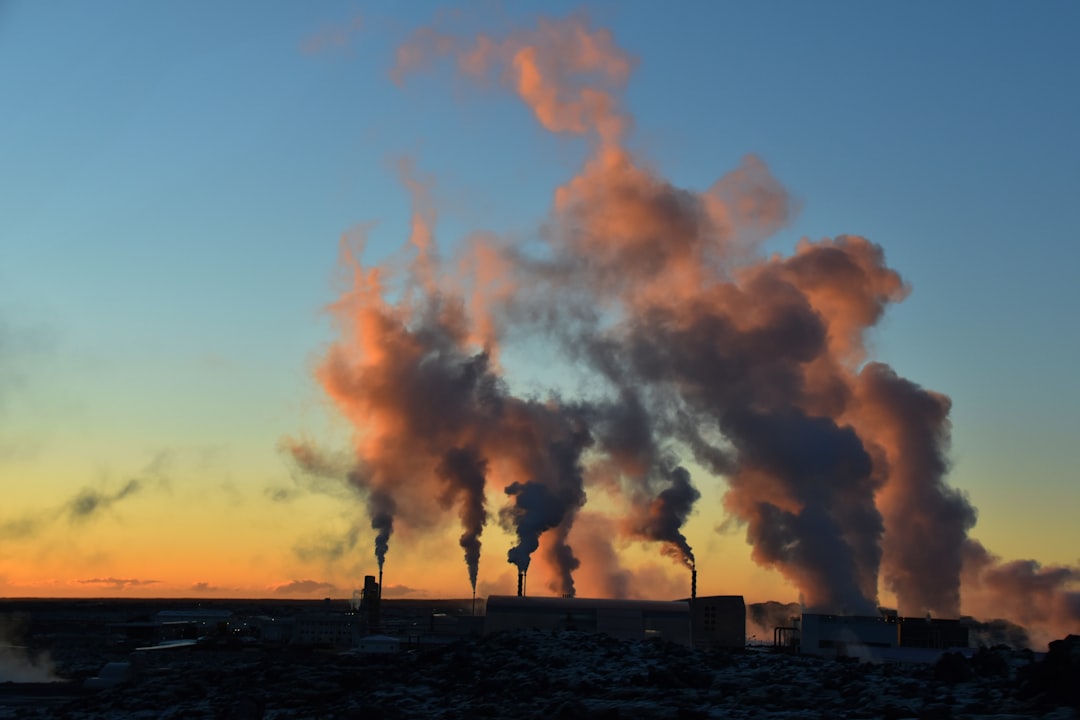 geothermal energy become bigger — diagram showing drill rig at sunrise with steam rising from ground