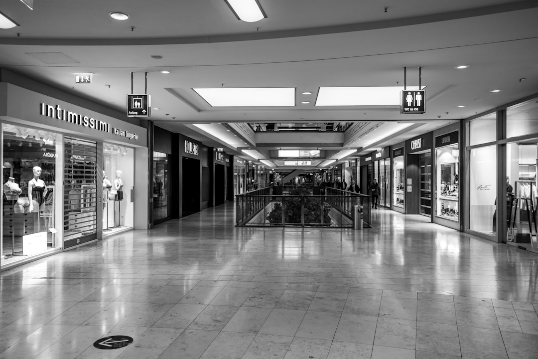 changing face shopping malls — Class A retail space with modern storefront displays and busy foot traffic