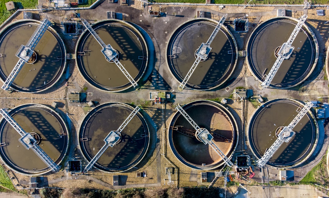 global expansion desalination future — industrial reverse osmosis plant with membrane filters and pressure gauges