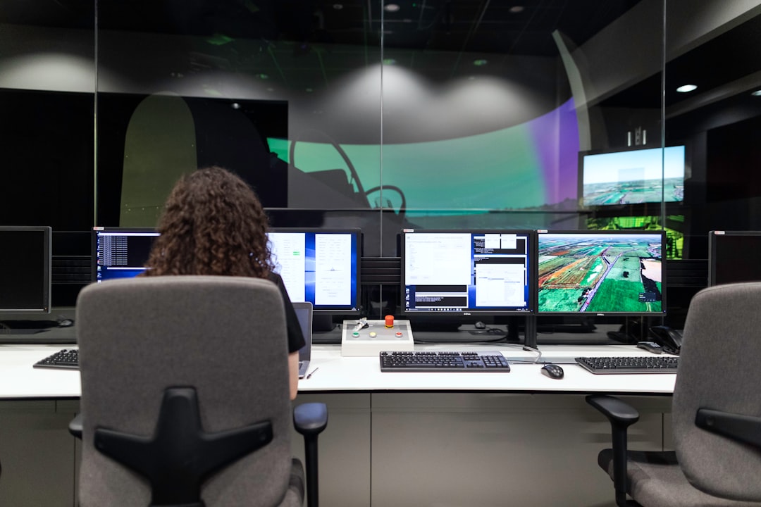 waste-to-energy projects urban infrastructure — control room with digital screens showing real-time emissions monitoring and plant operations data