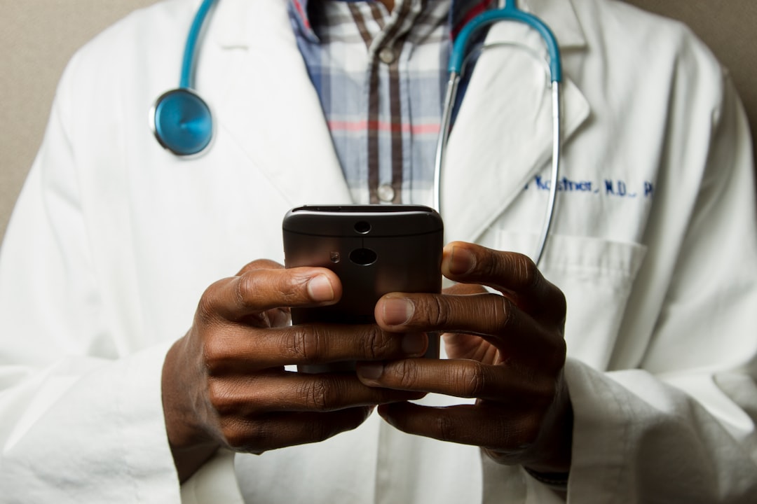 digital health records modern — patient reviewing health data on mobile phone application
