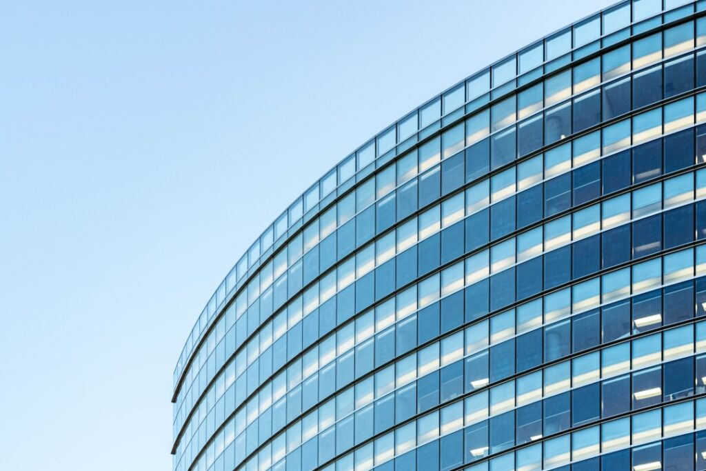 green building standards commercial — modern office building glass facade