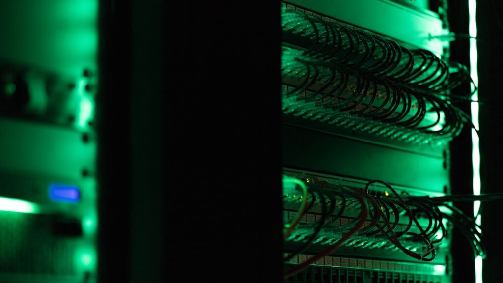 data center real estate — server room glowing data center