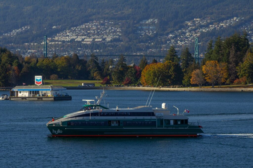 electric ferries momentum coastal — modern electric ferry harbor water