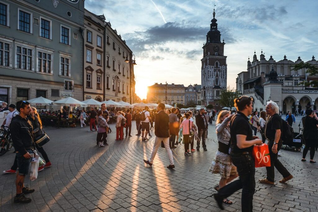 destination management rising tourist — crowded historic city street tourists