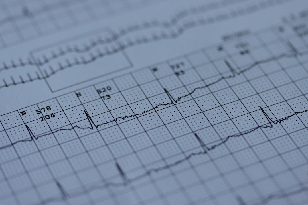 wearable medical devices preventive — ECG monitor displaying cardiac rhythm on smartwatch screen