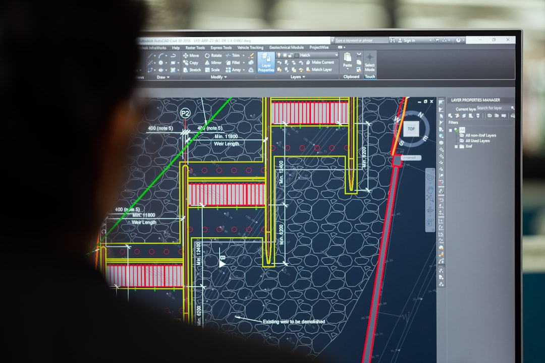 proptech property management real — multiple integrated software systems displayed on desktop screens