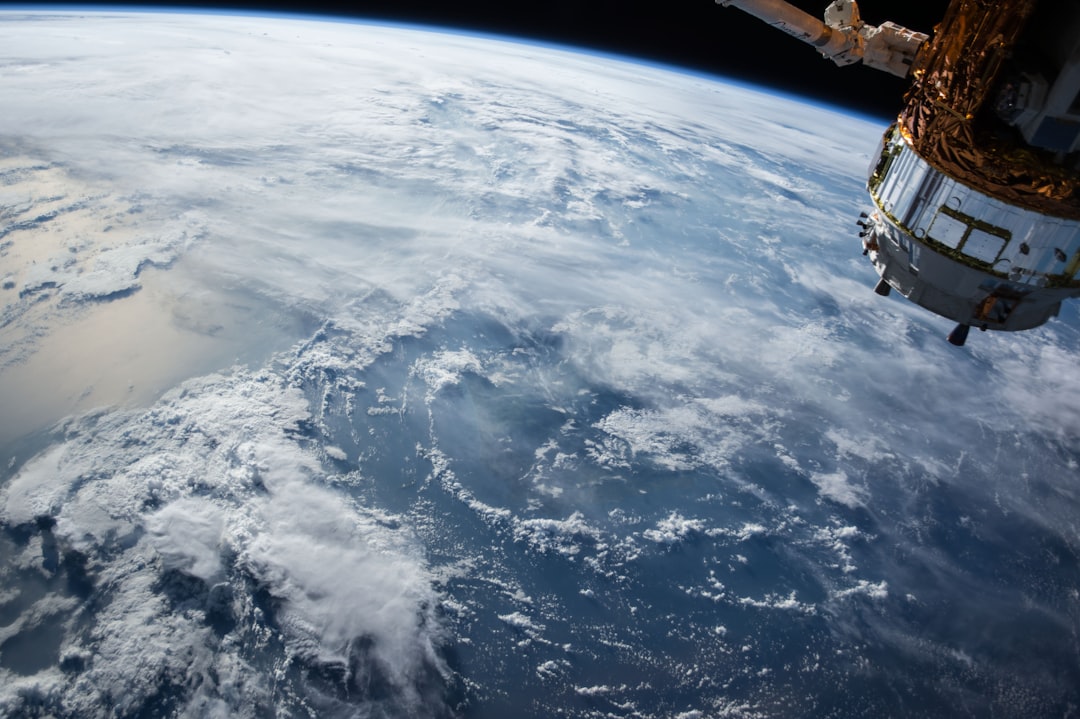 space insurance become major — satellite constellation visualization with earth below