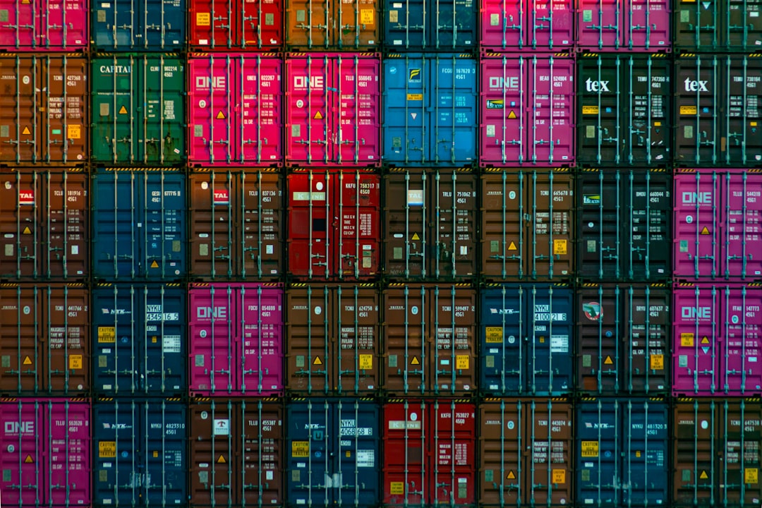 autonomous shipping change international — animated shipping container vessel cutting through digital waves on navigation screen