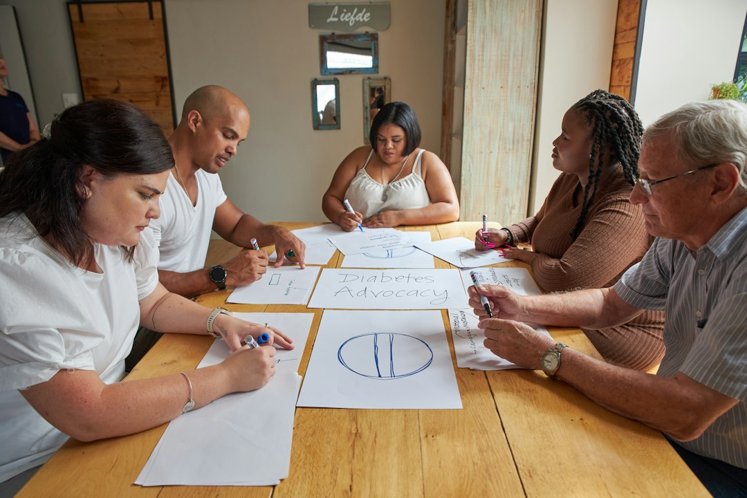 tourism investment emerging destinations — conference table with architects reviewing blueprints for new resort development